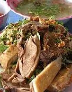 Vịt trời nấu cháo bóp gỏi